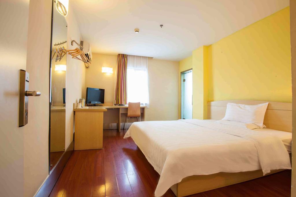 7Days Inn Guangzhou Panyu Chimlong South Railway Station Номер фото