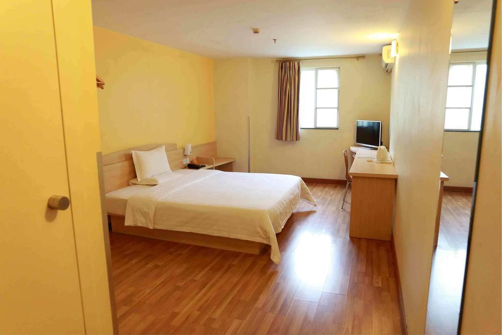 7Days Inn Guangzhou Panyu Chimlong South Railway Station Номер фото