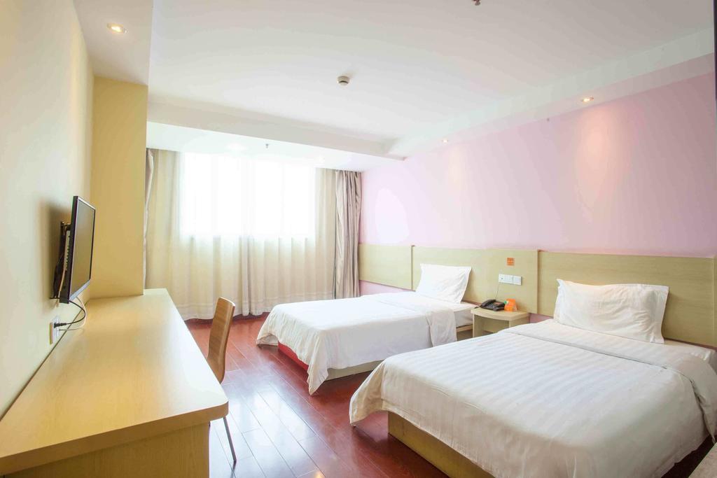 7Days Inn Guangzhou Panyu Chimlong South Railway Station Номер фото