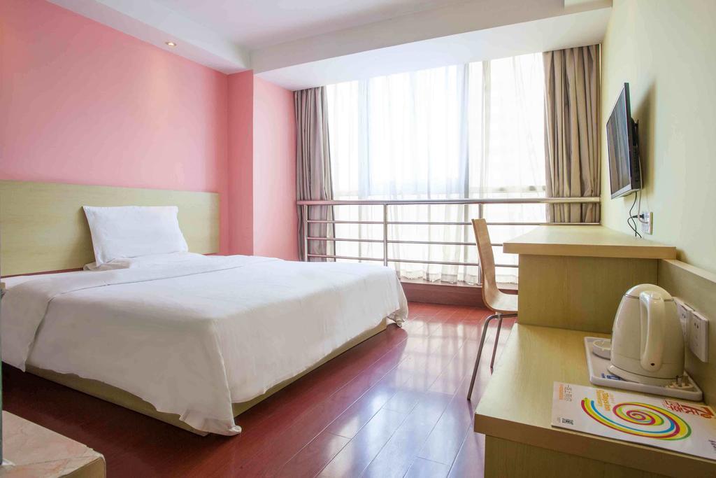 7Days Inn Guangzhou Panyu Chimlong South Railway Station Номер фото